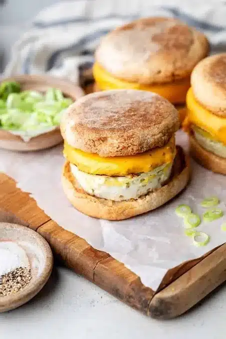 Delicious protein breakfast sandwich with eggs, cheese, and turkey on a toasted bun