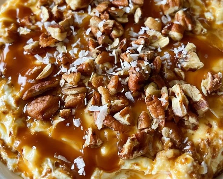 Creamy salted caramel pecan cheesecake dip served with fruit and crackers