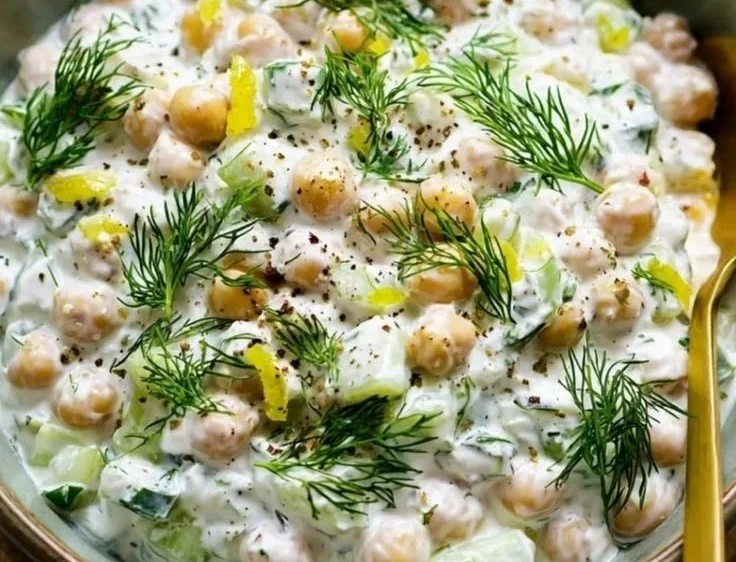 Delicious Tzatziki Chickpea Salad with fresh vegetables and herbs