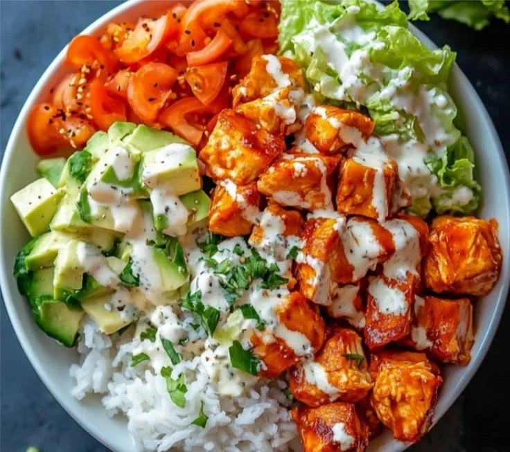 Delicious Buffalo Chicken Protein Bowl topped with fresh ingredients