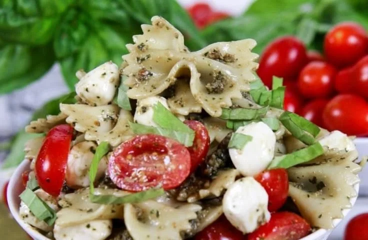 Delicious Caprese Pasta Salad with fresh tomatoes, mozzarella, and basil