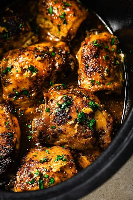 Crockpot Chicken dish served with vegetables