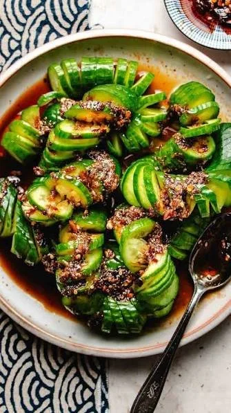 Refreshing Din Tai Fung-inspired cucumber salad with vibrant flavors and ingredients.