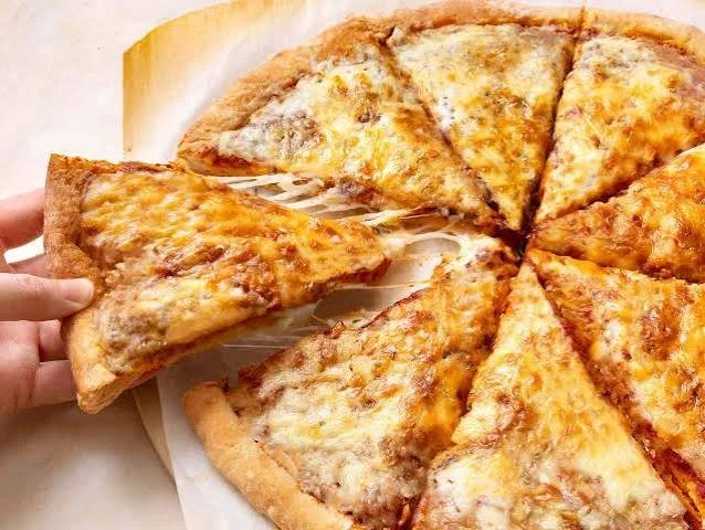 Easy homemade pizza dough ready for baking into delicious pizzas