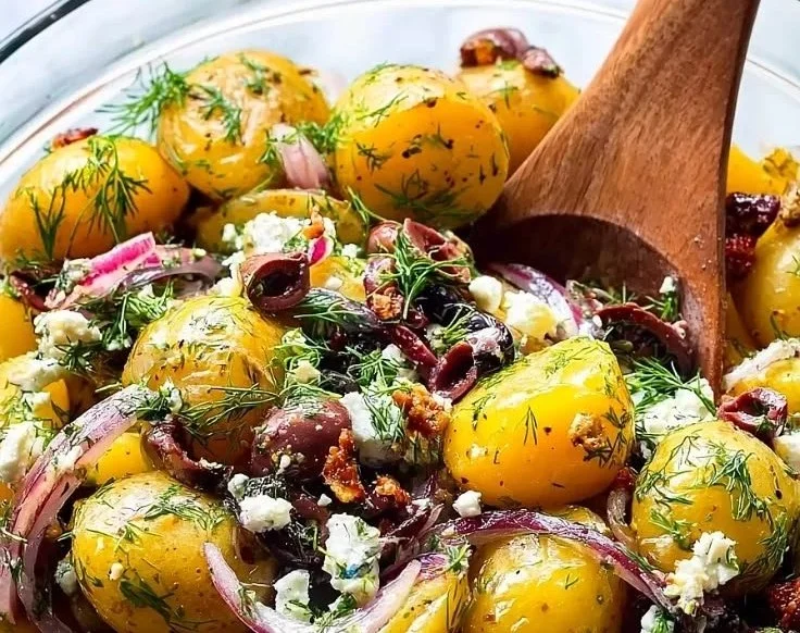 Greek Olive Potato Salad with fresh ingredients and vibrant colors