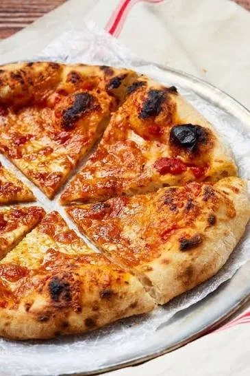Freshly made homemade pizza dough ready for toppings