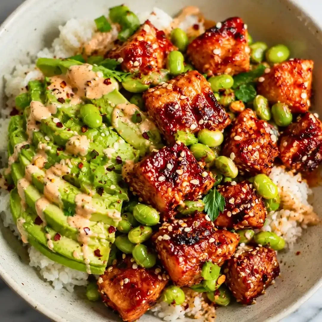 Delicious Honey Sriracha Salmon Bowl with vibrant vegetables and rice