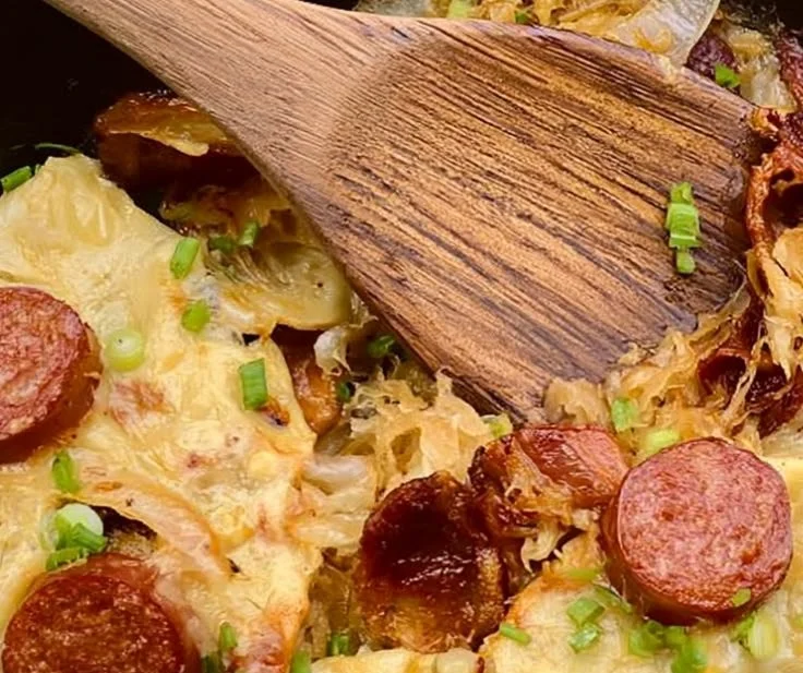 Kielbasa Pierogi Skillet Bake with golden pierogi and sliced kielbasa in a skillet