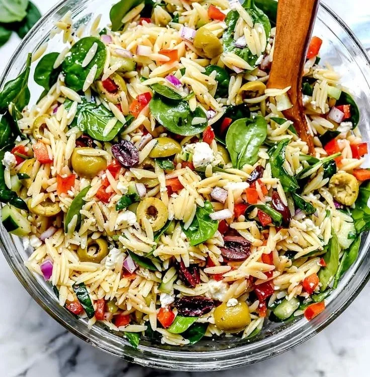 Colorful Mediterranean Orzo Pasta Salad with fresh vegetables and herbs