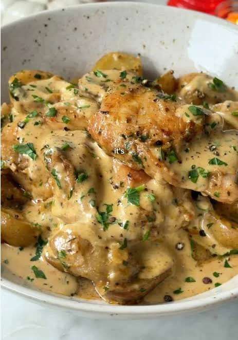 Slow cooker creamy chicken with potatoes in a dish
