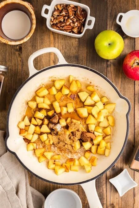 Delicious Caramel Apple Cinnamon Roll Casserole served in a baking dish.