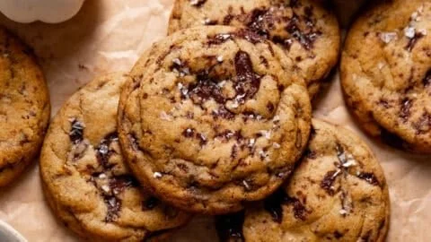 Plate of chewy pumpkin chocolate chip cookies fresh out of the oven