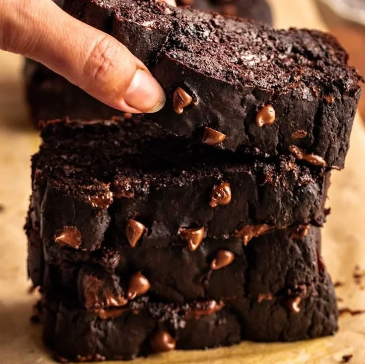 Freshly baked Chocolate Pumpkin Bread with a rich chocolate and pumpkin flavor.