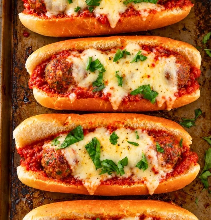Delicious easy cheesy meatball subs on a platter ready for family dinner or game day