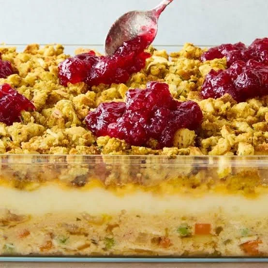 Easy Thanksgiving leftover turkey casserole topped with cheese and herbs