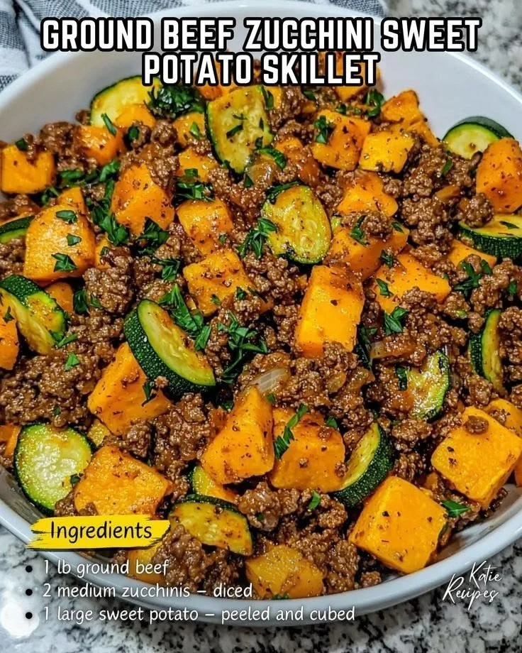 Delicious ground beef zucchini sweet potato bowls topped with fresh herbs