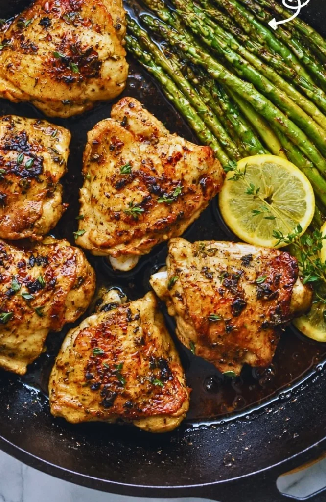 One pan lemon garlic chicken with asparagus served on a plate