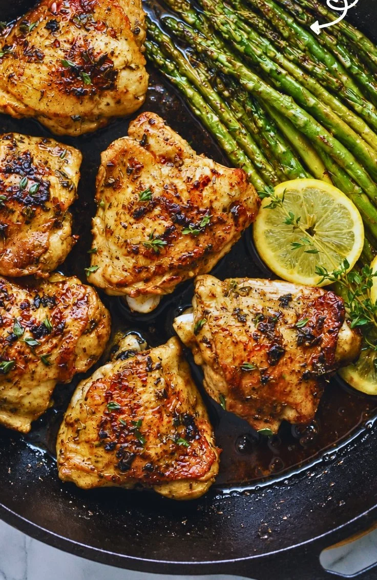 One pan lemon garlic chicken with asparagus served on a plate