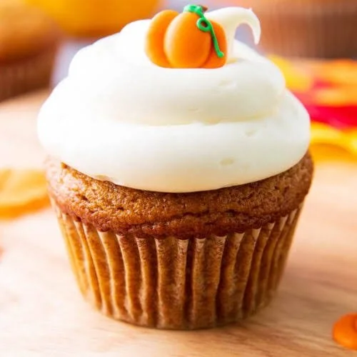 Delicious fall cupcakes decorated with autumn-themed frosting and sprinkles.